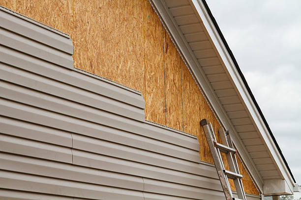 Professional Siding Contractor technician working in Butler, IN